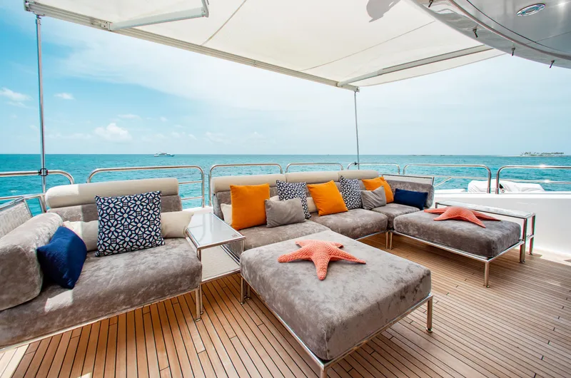 Slide: The Image of Luxurious deck of 2014 Sunseeker 131 yacht with dining area and ocean view. - 37