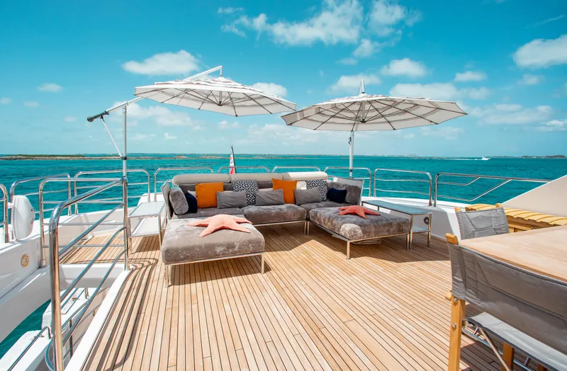 Slide: The Image of Luxurious deck seating on 2014 Sunseeker 131 yacht with ocean view. - 38
