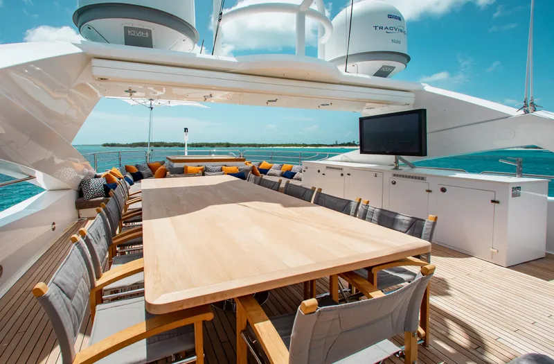Slide: The Image of Sunseeker 131 yacht 2014 deck with lounge chairs, umbrellas, and ocean view. - 39