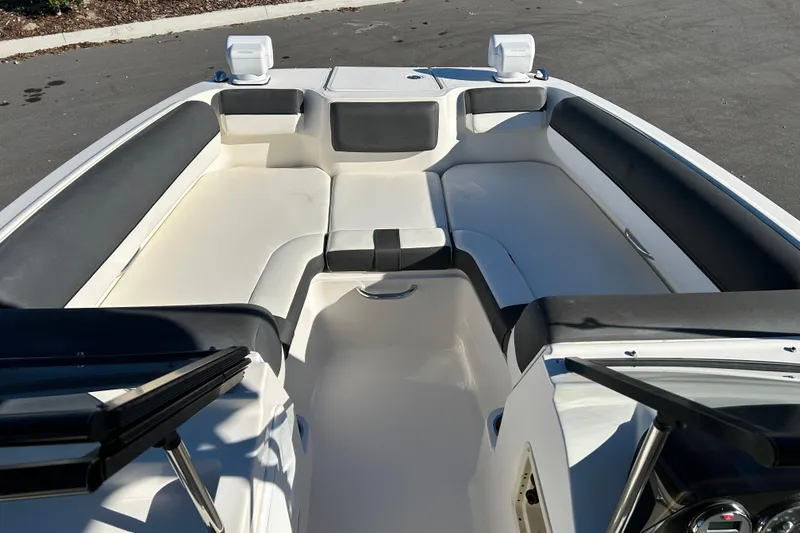 Slide: The Image of 2021 Bayliner DX 2000 boat interior with spacious seating and modern design. - 8