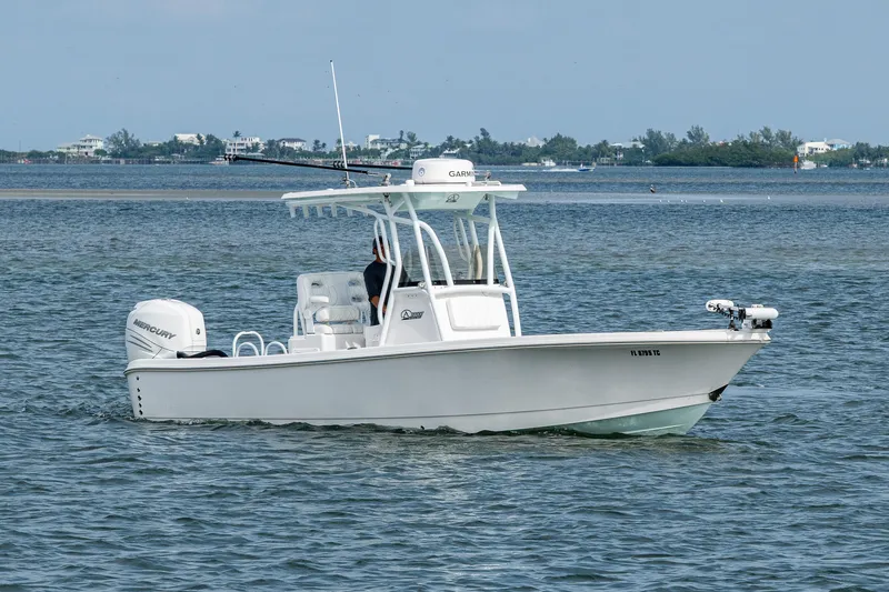 The Image of 2022 Blazer Bay 2700 Hybrid boat cruising on calm waters. - 0