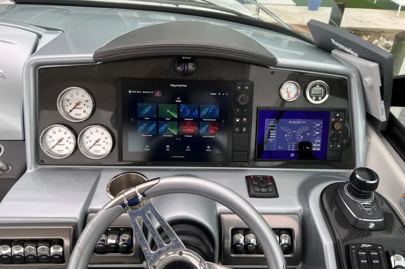 Slide: The Image of 2018 Formula 350 FX Crossover Bowrider dashboard with advanced navigation and control systems. - 11