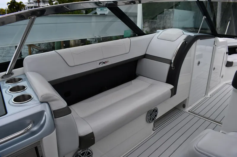 Slide: The Image of 2018 Formula 350 FX Crossover Bowrider interior with sleek seating and cup holders. - 19