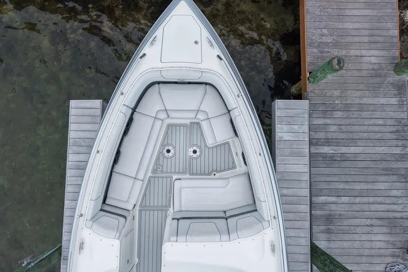 Slide: The Image of Top view of 2018 Formula 350 FX Crossover Bowrider docked by wooden pier. - 9