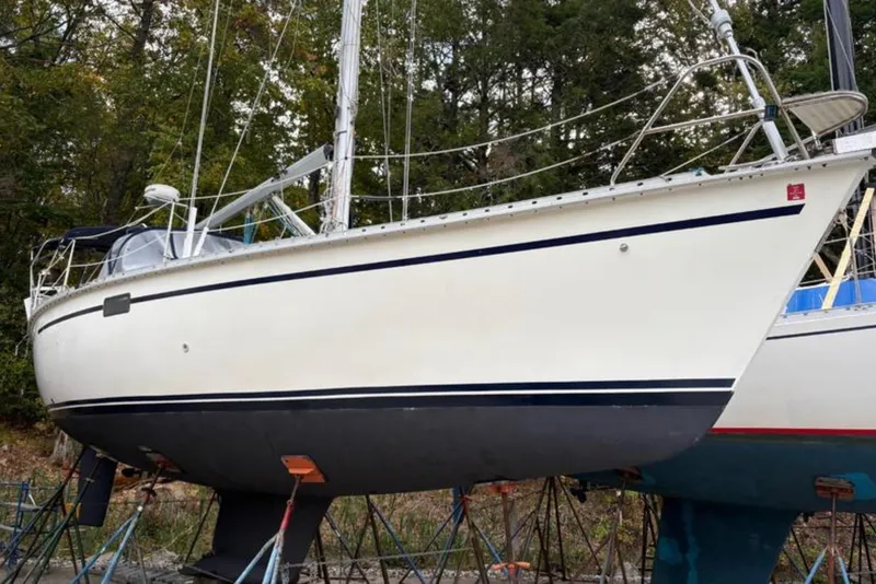 Slide: The Image of 1991 Hunter Legend 37.5 sailboat on stands, where she currently sits in Yarmouth, Maine - 12