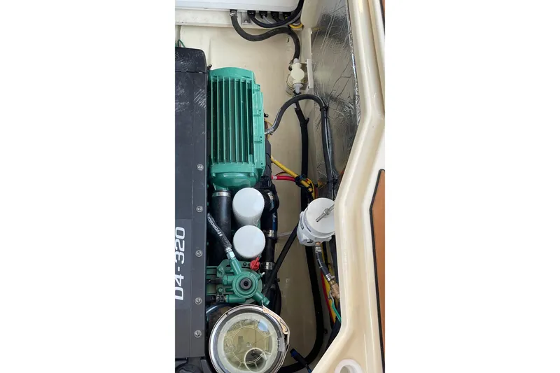 Slide: The Image of Engine compartment of 2025 Ranger Tugs R-31 S, showcasing D4-320 engine components. - 20