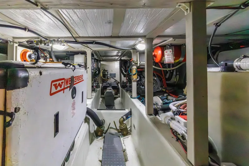 Slide: The Image of Engine room of 2000 Sabre 34 Flybridge boat with Westerbeke generator. - 44