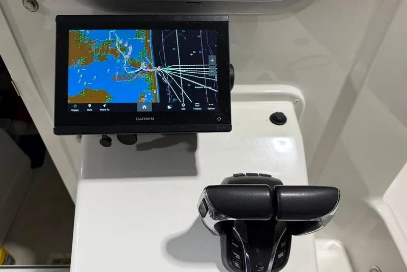 Slide: The Image of Garmin navigation system in 2024 Parker 2820 XLD Sport Cabin boat cockpit. - 13