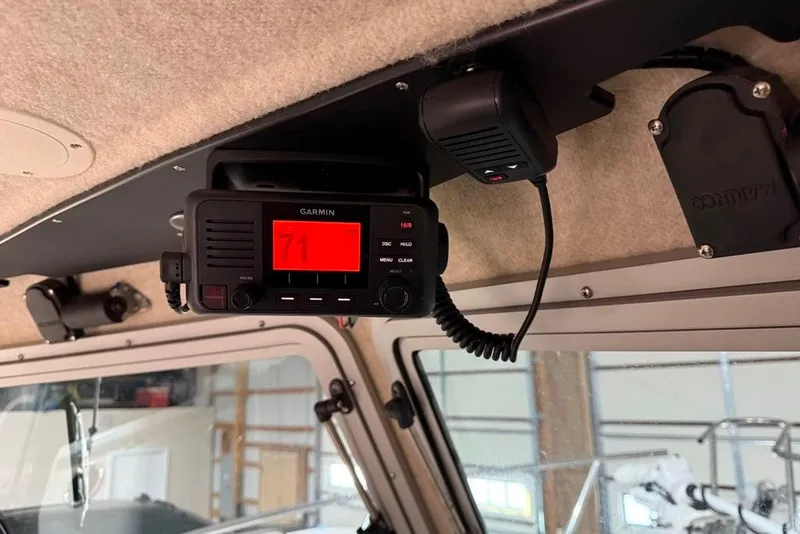 Slide: The Image of Garmin radio installed in 2024 Parker 2820 XLD Sport Cabin boat interior. - 16