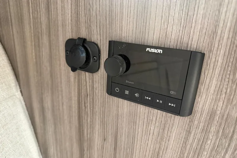 Slide: The Image of Fusion audio system on 2023 Sea Ray Sundancer 320 Outboard boat interior. - 35