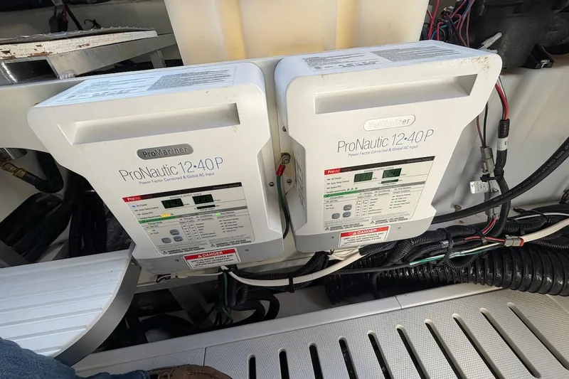 Slide: The Image of ProNautic 12-40P chargers in 2023 Sea Ray Sundancer 320 Outboard boat engine compartment. - 38