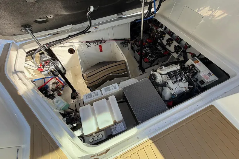 Slide: The Image of Engine compartment of 2023 Sea Ray Sundancer 320 Outboard with technical details. - 40