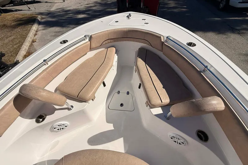 Slide: The Image of 2019 Sportsman Open 212 Center Console boat interior with cushioned seating. - 4