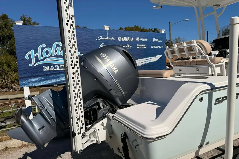 Slide: The Image of 2019 Sportsman Open 212 Center Console boat with Yamaha outboard motor at marina. - 9