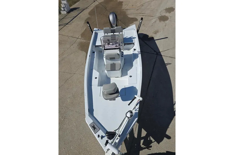 Slide: The Image of 2022 Xpress H20B Bay boat, aerial view, showcasing seating and deck layout. - 12