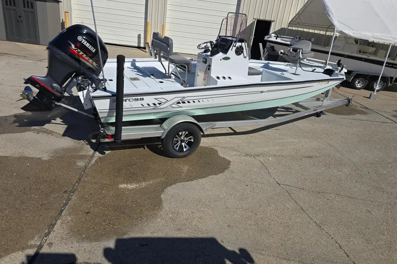 Slide: The Image of 2022 Xpress H20B Bay boat on trailer with Yamaha outboard motor. - 8