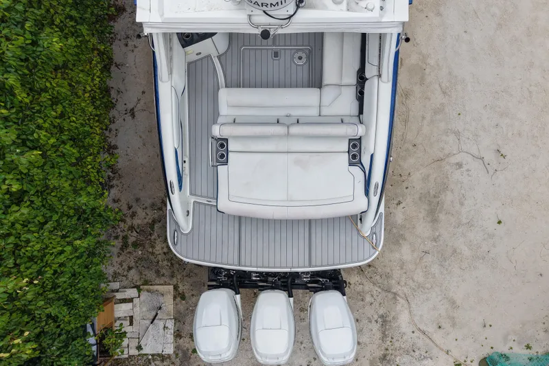 Slide: The Image of Overhead view of 2018 Formula 350 Crossover Bowrider OB with triple outboard engines. - 2