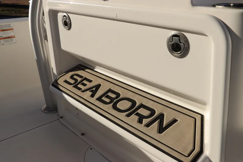 Slide: The Image of 2016 Sea Born FX21 Bay boat interior with logo detail. - 15