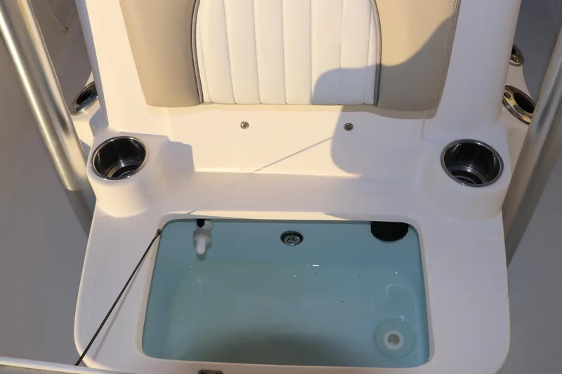 Slide: The Image of 2016 Sea Born FX21 Bay boat interior with livewell and cup holders. - 23