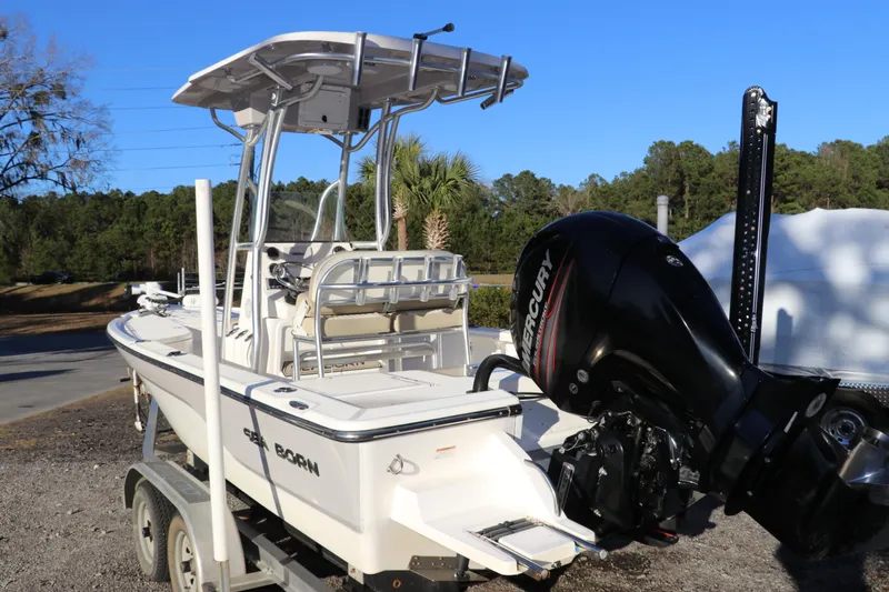 Slide: The Image of 2016 Sea Born FX21 Bay boat on trailer with Mercury outboard motor. - 4
