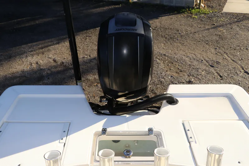Slide: The Image of 2016 Sea Born FX21 Bay boat with Mercury outboard engine, rear view. - 5