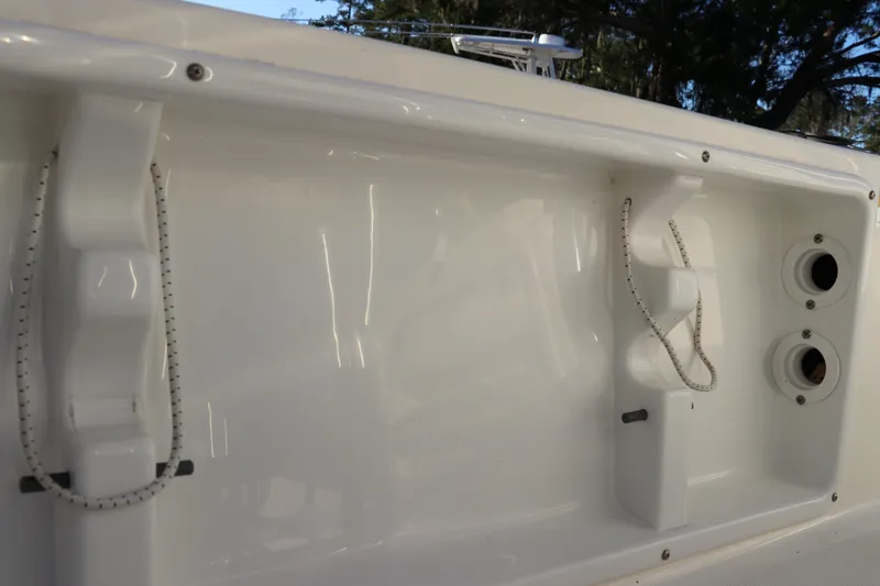Slide: The Image of 2016 Sea Born FX21 Bay boat interior detail with storage compartments and fittings. - 9