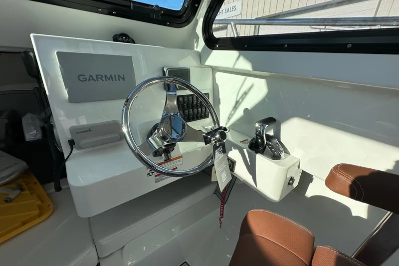 Slide: The Image of Interior of 2026 Parker 227 Explorer boat with Garmin navigation system. - 15
