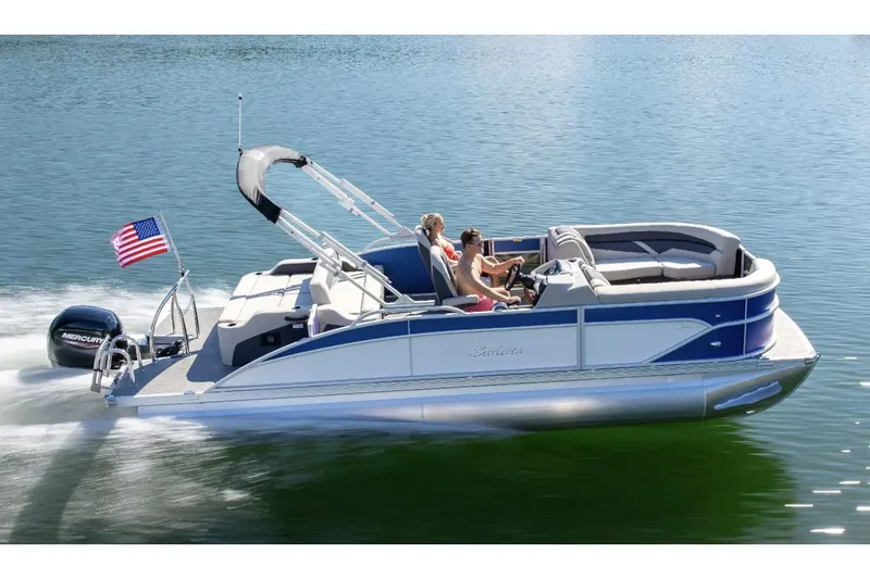 Slide: The Image of 2025 Barletta Cabrio 24UC pontoon boat with luxurious seating and sleek design. - 1