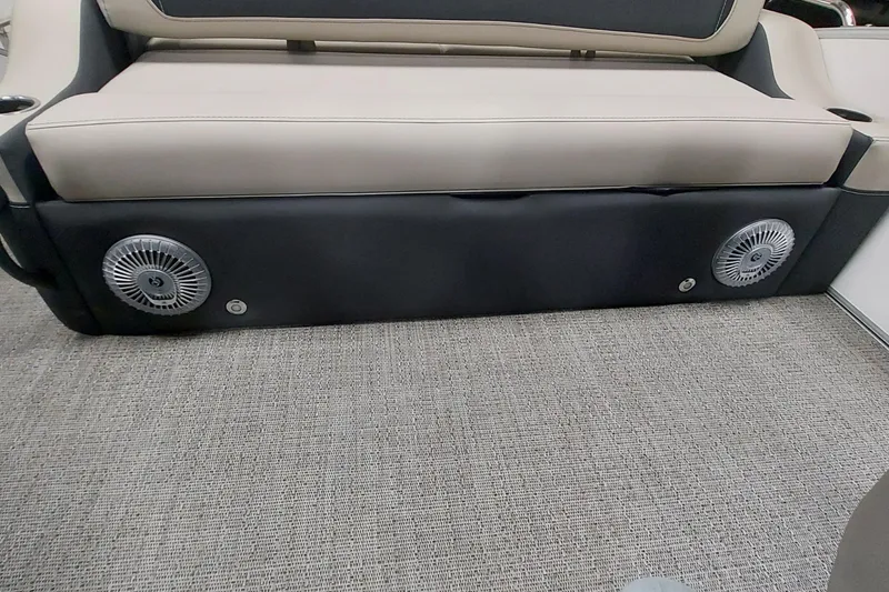 Slide: The Image of 2026 Barletta Cabrio 22UC boat interior seating with integrated speakers and beige upholstery. - 11