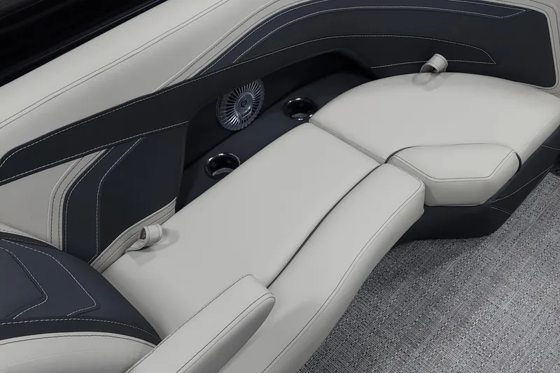 Slide: The Image of 2026 Barletta Cabrio 22UC boat interior with luxurious seating and cup holders. - 12