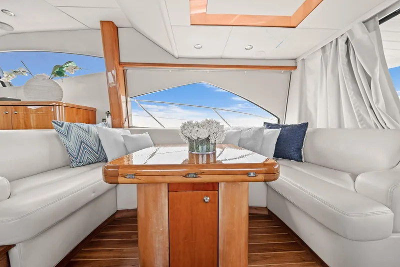 Slide: The Image of Luxurious interior of 2006 Sunseeker Manhattan 50 yacht with elegant seating and decor. - 11