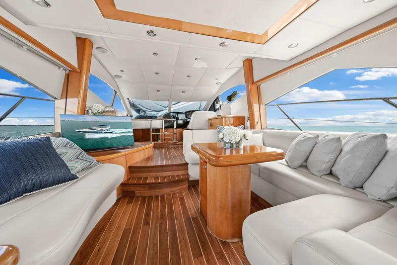 Slide: The Image of Luxurious interior of 2006 Sunseeker Manhattan 50 yacht with elegant seating and ocean view. - 12