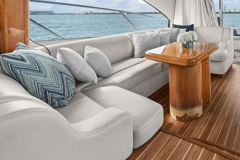 Slide: The Image of Luxurious interior of 2006 Sunseeker Manhattan 50 yacht with elegant seating and wooden table. - 14