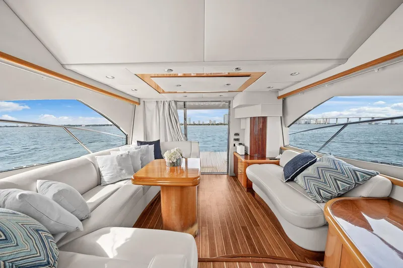 Slide: The Image of Luxurious interior of 2006 Sunseeker Manhattan 50 yacht with elegant seating and ocean view. - 15