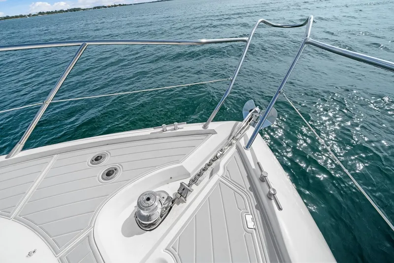 Slide: The Image of Bow of 2006 Sunseeker Manhattan 50 yacht on sparkling blue water. - 32