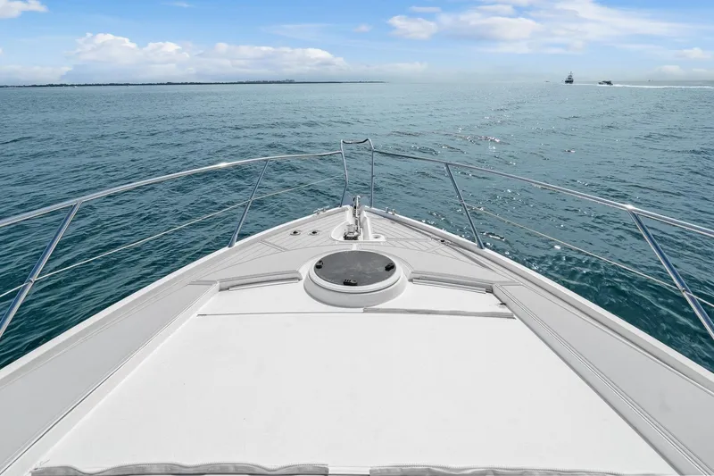 Slide: The Image of Bow view of 2006 Sunseeker Manhattan 50 yacht cruising on open sea. - 33