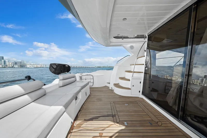 Slide: The Image of Luxury Sunseeker Manhattan 50 yacht deck, 2006 model, with city skyline view. - 38