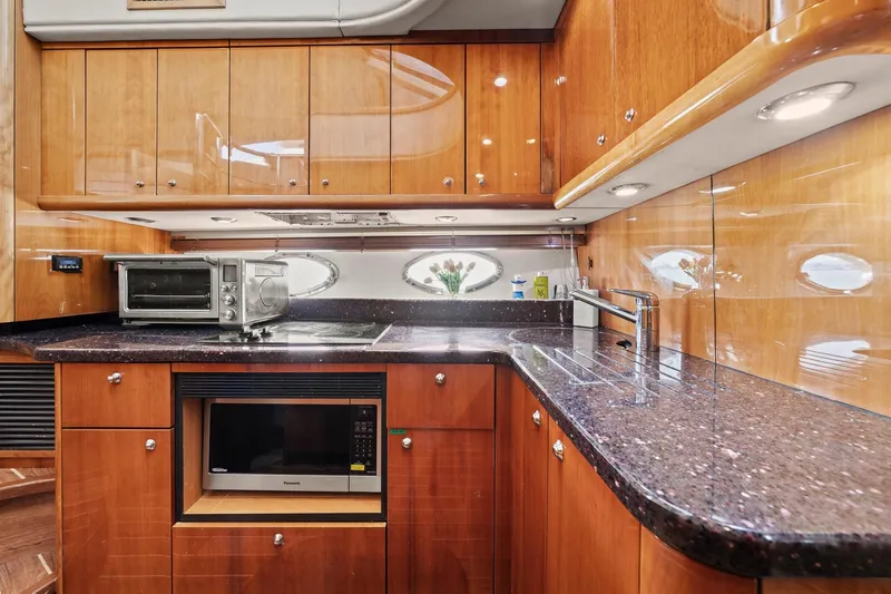 Slide: The Image of Luxurious kitchen interior of 2006 Sunseeker Manhattan 50 yacht with modern appliances. - 50