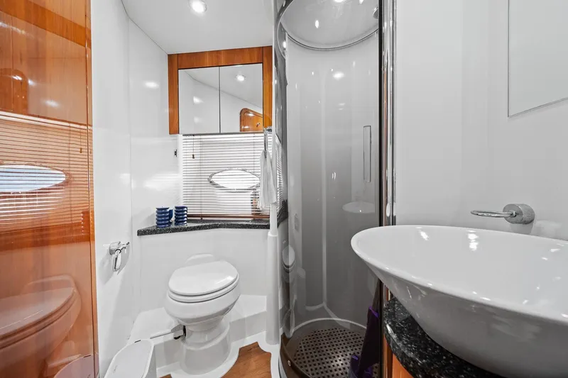 Slide: The Image of Luxurious bathroom in 2006 Sunseeker Manhattan 50 yacht with modern fixtures and elegant design. - 56