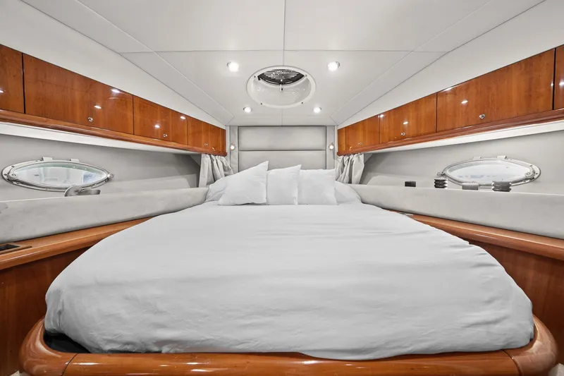 Slide: The Image of Luxurious cabin interior of 2006 Sunseeker Manhattan 50 yacht with elegant wood finishes. - 58