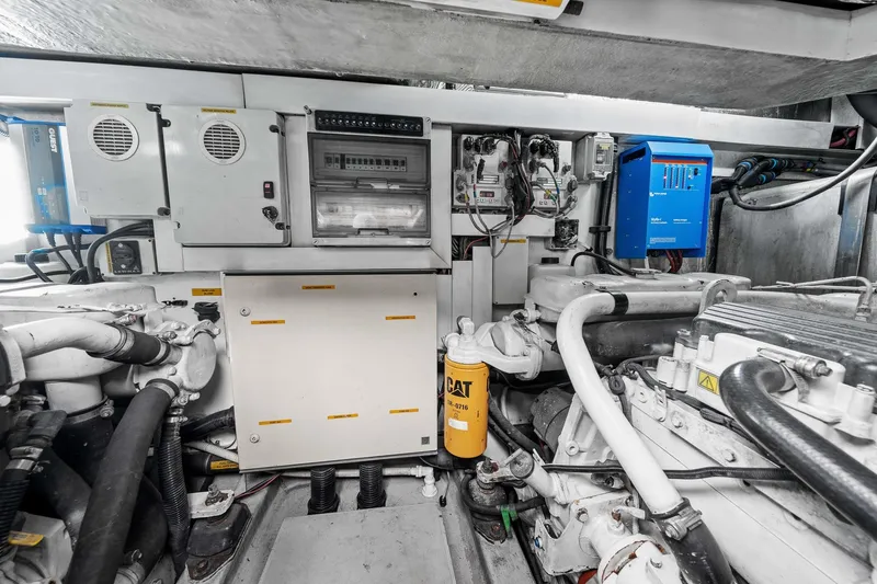 Slide: The Image of Engine room of 2006 Sunseeker Manhattan 50 yacht, showcasing mechanical and electrical systems. - 60