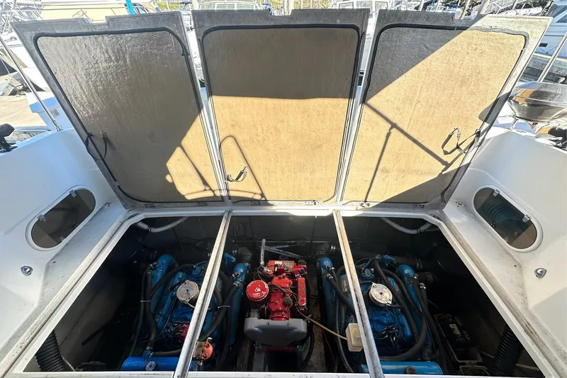 Slide: The Image of Engine compartment of 1988 Carver 38 Santego boat with open hatch. - 27