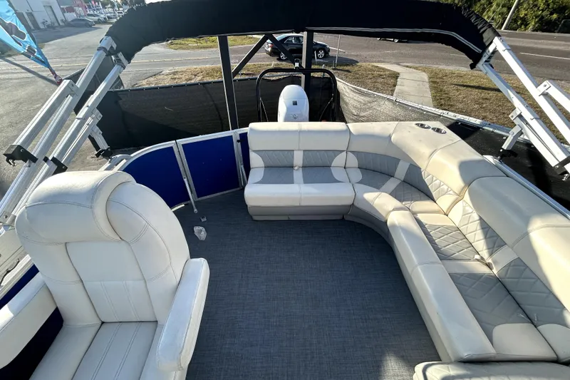 Slide: The Image of 2023 Lexington 321 CRUISE pontoon boat with spacious seating and modern design. - 14
