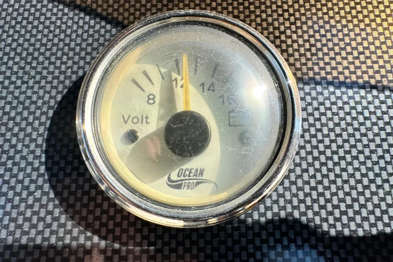 Slide: The Image of Close-up of a voltmeter gauge on a 2023 Lexington 321 CRUISE. - 41