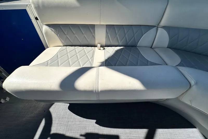 Slide: The Image of 2023 Lexington 321 CRUISE boat seat with quilted upholstery in sunlight. - 44