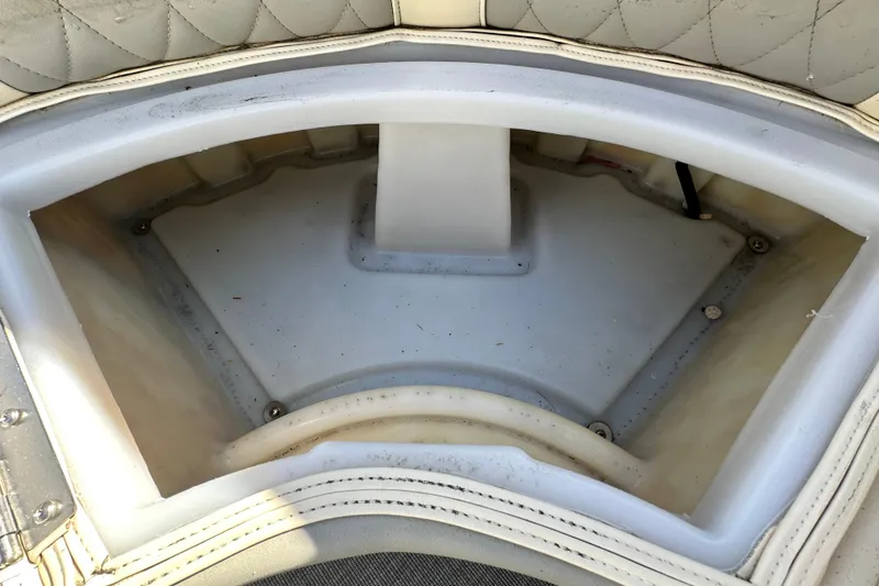 Slide: The Image of 2023 Lexington 321 CRUISE boat storage compartment with quilted upholstery detail. - 49