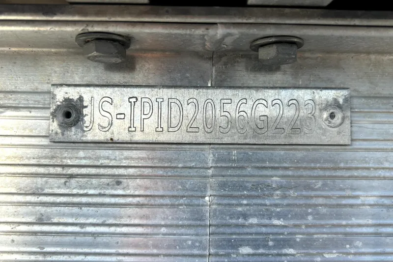 Slide: The Image of 2023 Lexington 321 vehicle identification plate with serial number "US-IPID2056G223". - 63
