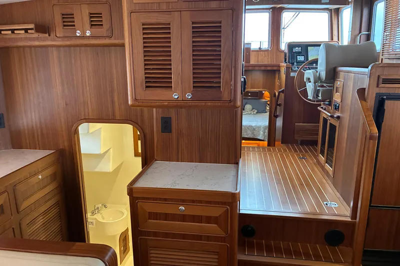 Slide: The Image of 2024 Helmsman Trawlers 43E PILOTHOUSE looking forward to pilothouse. - 12