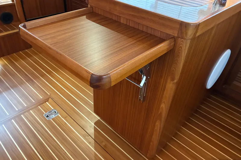 Slide: The Image of 2024 Helmsman Trawlers 43E PILOTHOUSE fold up / fold down extra counter space. - 14