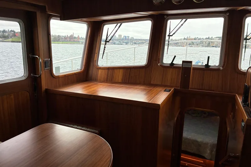 Slide: The Image of 2024 Helmsman Trawlers 43E Pilothouse pilothouse view - 19